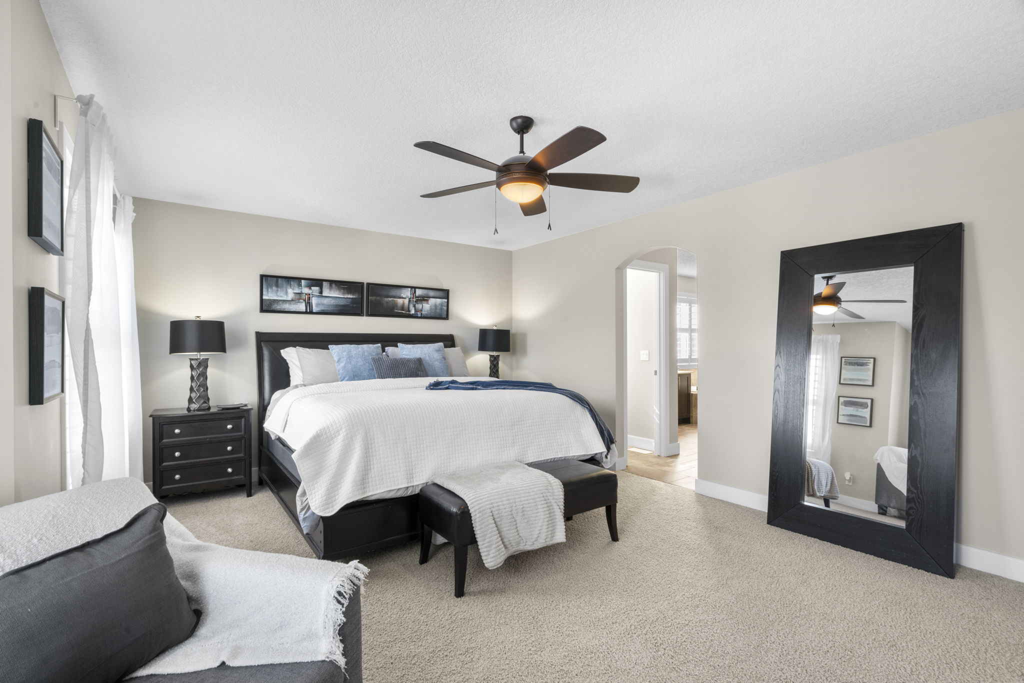 Spacious primary bedroom on the upper floor
